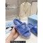Prada Enameled metal triangle logo shearling Slide sandals Blue 2023