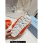 Prada Enameled metal triangle logo shearling padded slippers Orange 2023