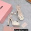 Miu Miu Heel 14cm Patent leather platform 4cm sandals White with crystals 2023