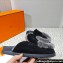 Hermes Go Women/Men mules in suede goatskin and shearling Black 2023