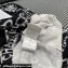 Chanel Cashmere Cardigan P74386 Black/White 2023