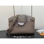 Louis Vuitton Taurillon leather Lock It MM Bag M22927 Earth 2023