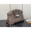 Louis Vuitton Taurillon leather Lock It MM Bag M22927 Earth 2023