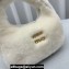 Miu Miu Wander shearling hobo bag with leather details 5BC125 White 2023