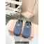 Miu Miu Denim mules with logo-engraved metal coin 5D058E Blue 2024