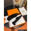 Hermes Royal loafer in suede goatskin Black with fringe and tone-on-tone lacquered palladium-plated signature "H" detail