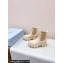 Prada Monolith brushed leather booties Beige with Enameled metal triangle logo 1T256N 2024