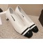 Chanel Heel 5cm CC Logo White and Black Patent Leather Pumps 2024