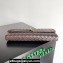 Bottega Veneta Long Clutch Andiamo With Handle Intrecciato leather bag FONDANT with metallic knot closure 2024