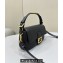 Fendi by Stefano Pilati Medium Baguette Bag handle with metal FENDI lettering in Black nappa leather 2024
