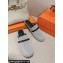 Hermes Groupie mules in H canvas and calfskin with miniature permabrass-plated Paris buckle