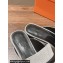 Hermes Groupie mules in H canvas and calfskin with miniature permabrass-plated Paris buckle