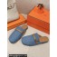 Hermes Groupie mules in denim Blue and calfskin with miniature permabrass-plated Paris buckle