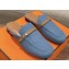 Hermes Groupie mules in denim Blue and calfskin with miniature permabrass-plated Paris buckle