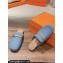 Hermes Groupie mules in denim Blue and calfskin with miniature permabrass-plated Paris buckle