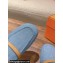 Hermes Groupie mules in denim Blue and calfskin with miniature permabrass-plated Paris buckle