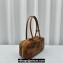 Miu Miu leather patchwork bag 5BB148 Cognac 2024