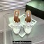 Alaia Heel 10.5cm Confetti Mules In Patent Leather White 2024