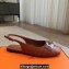 Hermes Innocente slingbacks Flats Brown in goatskin with iconic oversized Kelly buckle 2024