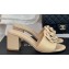 Chanel Heel 6.5cm Lambskin Mules with Camellia G45499 Beige 2024