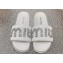 Miu Miu Matelassé nappa leather slides White with Crystal Logo 2024