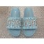 Miu Miu Matelassé nappa leather slides Blue with Crystal Logo 2024