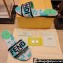 Fendi Signature Slides in canvas Green with all-over floral print 2024