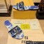 Fendi Signature Slides in canvas Blue with all-over floral print 2024