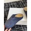 The Row Hugo Slides in Suede Blue 2024