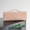 Bottega Veneta Long Clutch Andiamo With Handle Intrecciato leather bag Nude Pink with metallic knot closure 2024