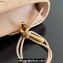 Bottega Veneta Long Clutch Andiamo With Handle Intrecciato leather bag Nude Pink with metallic knot closure 2024