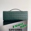 Bottega Veneta Long Clutch Andiamo With Handle Intrecciato leather bag Emerald green with metallic knot closure 2024