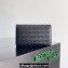 Bottega Veneta Andiamo Large Flap Wallet Black with metallic knot closure 2024
