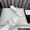 Chanel Lambskin & Imitation Pearls Mules G45685 White 2024