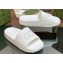 Gucci Women/Men Interlocking G slide sandals 770801 in textured rubber White 2024