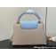 Louis Vuitton Lovelock chain Taurillon leather Capucines MM Bag Creamy 2024