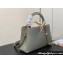 Louis Vuitton Lovelock chain Taurillon leather Capucines MM Bag Dusty Green 2024