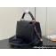 Louis Vuitton Lovelock chain Taurillon leather Capucines MM Bag Black 2024