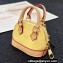 Louis Vuitton Micro Alma Vernis Bag Charm and Key Holder M01707 Yellow