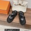 Hermes Inboard sandals in woven ribbon and calfskin Black 2024