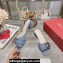 Roger Vivier Très Vivier Metal Buckle Mules in Denim Blue 2024