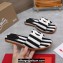 Christian Louboutin timeless CL mules in striped fabric Black 2024
