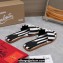 Christian Louboutin timeless CL mules in striped fabric Black 2024