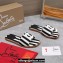Christian Louboutin timeless CL mules in striped fabric Black 2024