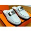 Hermes Iota mules in calfskin Pale Gray with iconic oversized Kelly buckle (original quality)