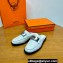 Hermes Iota mules in calfskin Pale Gray with iconic oversized Kelly buckle (original quality)