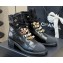 Chanel Crinkled Calfskin, Grosgrain, Imitation Pearls, Strass & Metal Combat Boots G45856 Black 2024