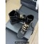 Chanel Crinkled Calfskin, Grosgrain, Imitation Pearls, Strass & Metal Combat Boots G45856 Black 2024