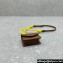 Miu Miu Leather, cord, and metal trick with mini-pouch bag 5TL515 Cognac/Yellow 2024