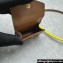 Miu Miu Leather, cord, and metal trick with mini-pouch bag 5TL515 Cognac/Yellow 2024